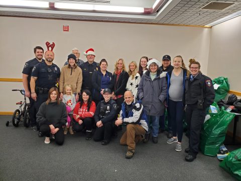 Group of those who helped with packing and sorting for Fond du Lac PD Kids' needy families. Fond du Lac Seventh-day Adventist members who helped were Pastor Carlos Ancheta and Vickie Mally.